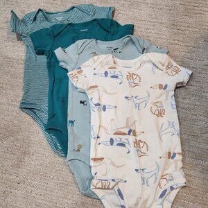 4 dog motif onesies